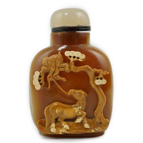 137 - A good Chinese cameo chalcedony 'horse and monkey' snuff bottle, 19th century, skilfully carved from... 