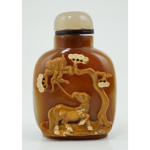 137 - A good Chinese cameo chalcedony 'horse and monkey' snuff bottle, 19th century, skilfully carved from... 