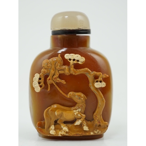 137 - A good Chinese cameo chalcedony 'horse and monkey' snuff bottle, 19th century, skilfully carved from... 