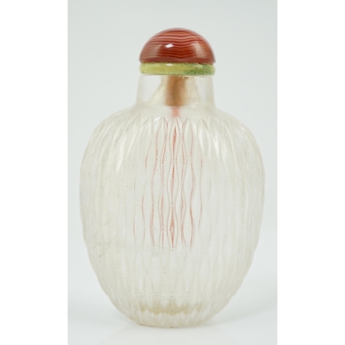 138 - A Chinese rock crystal basketweave carved snuff bottle, 19th century, on an oval foot, 6.7cm highPro... 
