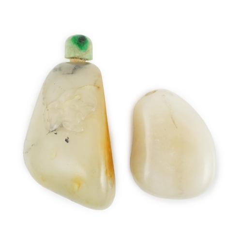 139 - Two Chinese jade pebble snuff bottles, 19th century, the larger pale celadon and russet skin jade sn... 