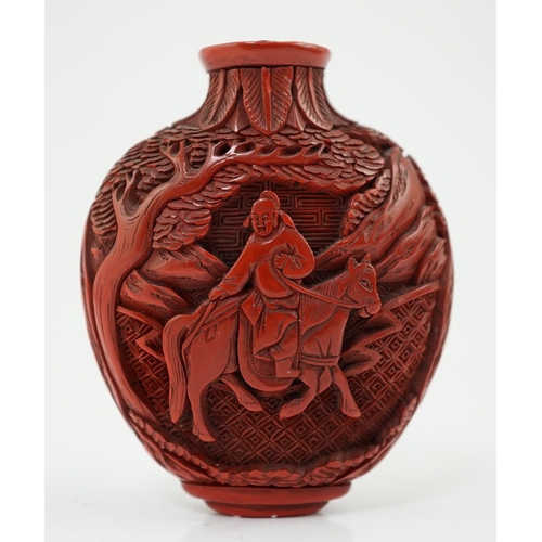 141 - A Chinese cinnabar lacquer snuff bottle, 19th century, of flattened ovoid form, carved in high relie... 