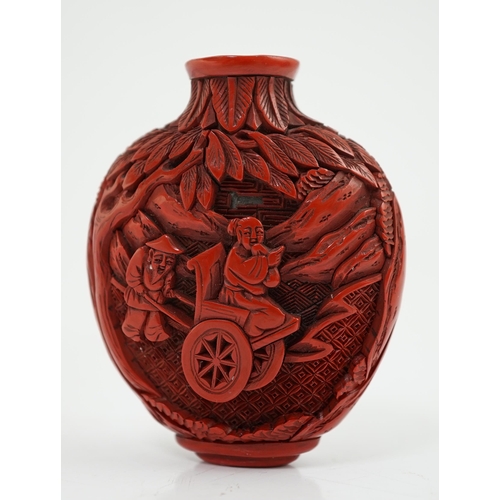 141 - A Chinese cinnabar lacquer snuff bottle, 19th century, of flattened ovoid form, carved in high relie... 