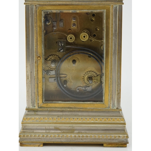 163 - An early 20th century French silvered brass grand sonnerie alarum carriage clock with fretwork panel... 