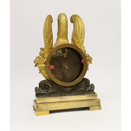 172 - J. Schwearer, Regents Park, a Regency bronze and ormolu mantel timepiece of drum case form with swan... 