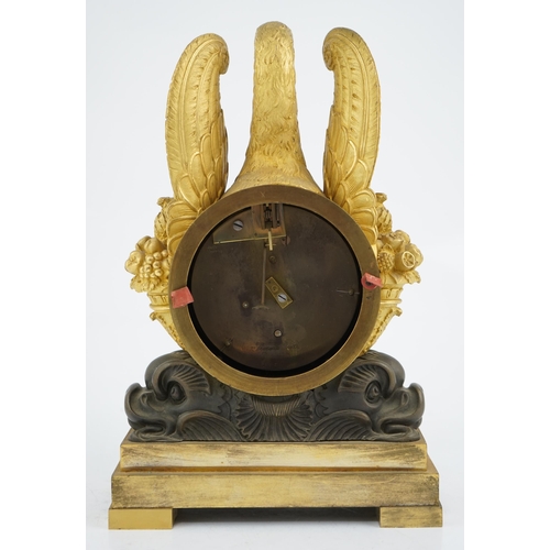 172 - J. Schwearer, Regents Park, a Regency bronze and ormolu mantel timepiece of drum case form with swan... 