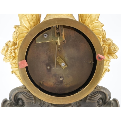 172 - J. Schwearer, Regents Park, a Regency bronze and ormolu mantel timepiece of drum case form with swan... 