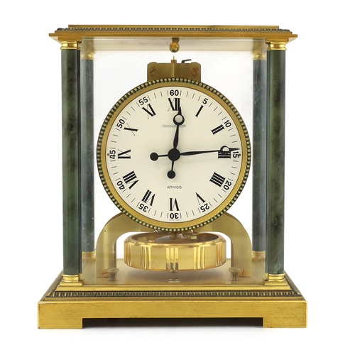 175 - A Jaeger le Coultre Atmos clock with lacquered brass and simulated marble column case, 21cm wide, 16... 