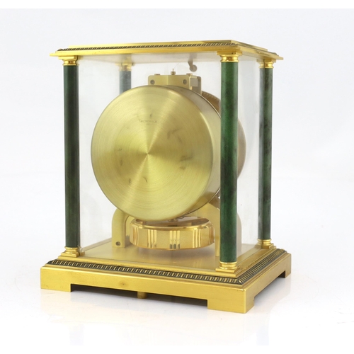 175 - A Jaeger le Coultre Atmos clock with lacquered brass and simulated marble column case, 21cm wide, 16... 