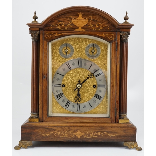 178 - A late Victorian marquetry inlaid rosewood chiming bracket clock in arched architectural case, with ... 