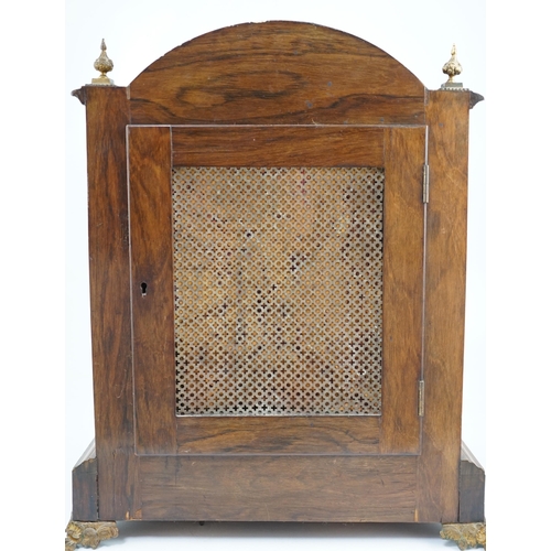 178 - A late Victorian marquetry inlaid rosewood chiming bracket clock in arched architectural case, with ... 