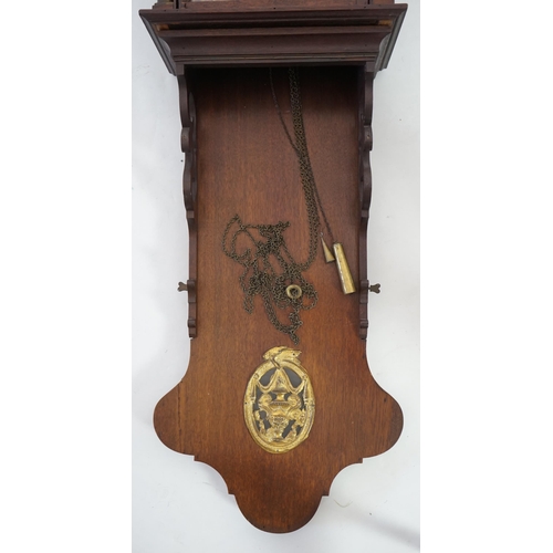 182 - A late 18th century Dutch Frisian Staart oak eight day wall clock with atlas and angel finials, hood... 