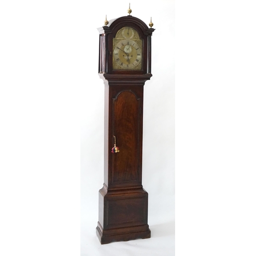 184 - Thomas Garner of London, a George III mahogany eight day longcase clock, the arched brass dial with ... 