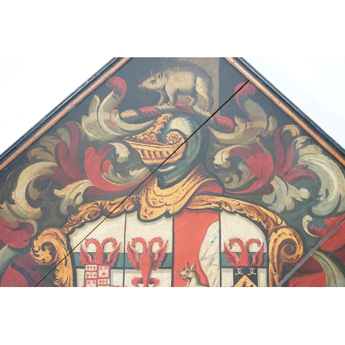 19 - A late 18th / early 19th century oil on wooden panel hatchment with coat of arms with wild boar cres... 