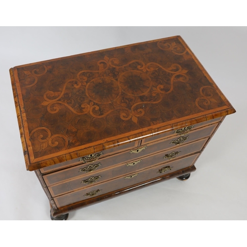 197 - A William and Mary oyster veneered laburnum and walnut chest with scrollwork marquetry to the top, t... 