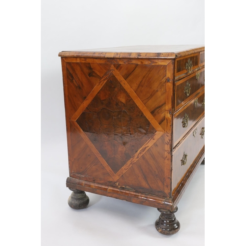 197 - A William and Mary oyster veneered laburnum and walnut chest with scrollwork marquetry to the top, t... 