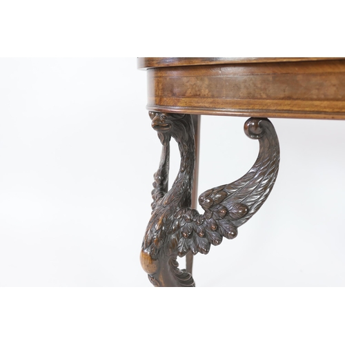 199 - A mid 18th century style walnut card table with crossbanded D shaped burr wood top, on winged eagle ... 