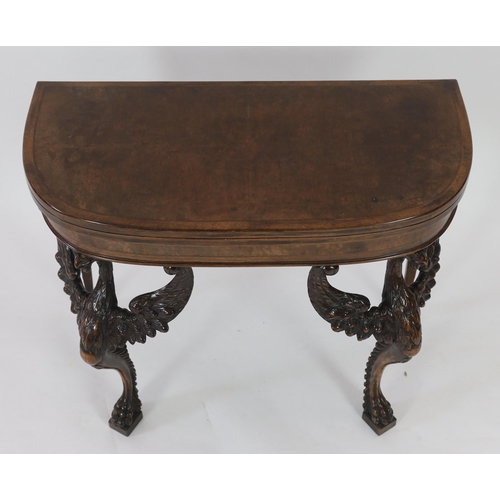 199 - A mid 18th century style walnut card table with crossbanded D shaped burr wood top, on winged eagle ... 