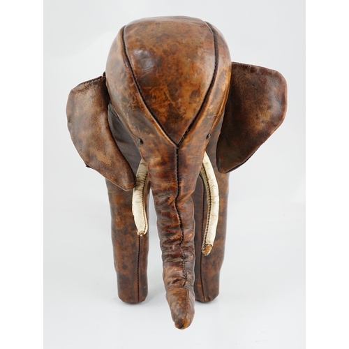 2 - Omersa for Liberty & Co., a brown leather model of an elephant with button eyes and white leather tu... 