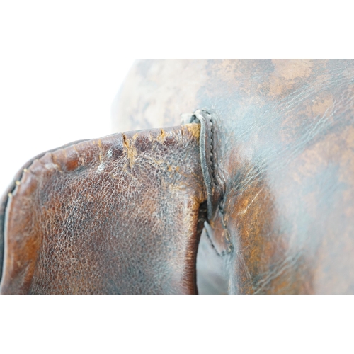 2 - Omersa for Liberty & Co., a brown leather model of an elephant with button eyes and white leather tu... 