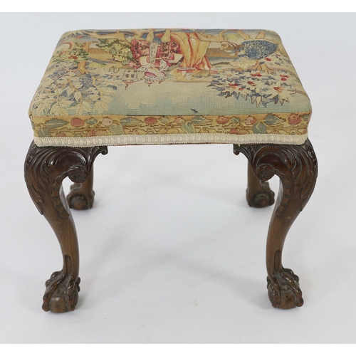 201 - A George III mahogany dressing stool with later needlework top depicting medieval figures, on acanth... 