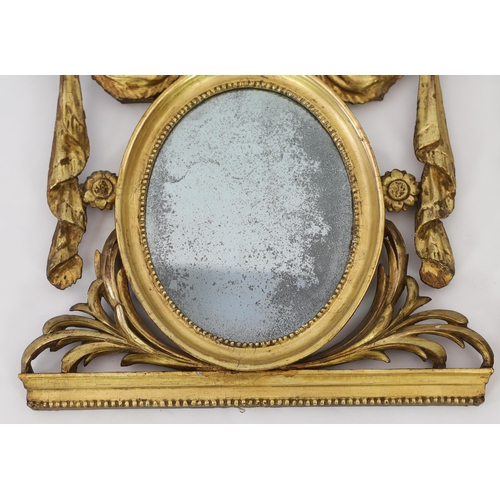 204 - A pair of late 18th century Adam period giltwood wall mirrors with urn and ribbon swag crests over o... 