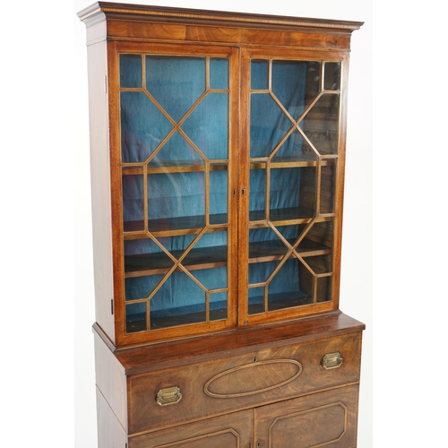 205 - A late George III mahogany secretaire bookcase, the moulded cornice with inlaid dentil work over two... 