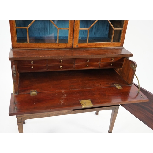 205 - A late George III mahogany secretaire bookcase, the moulded cornice with inlaid dentil work over two... 