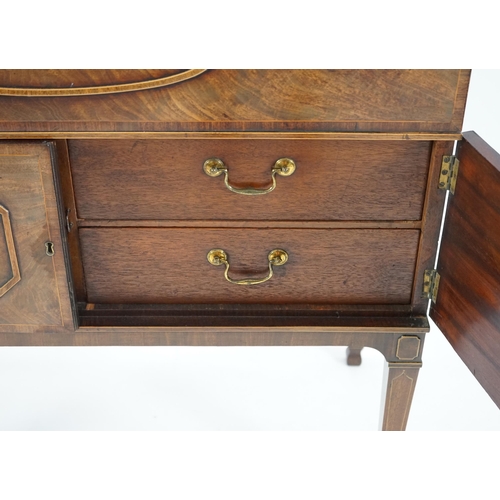 205 - A late George III mahogany secretaire bookcase, the moulded cornice with inlaid dentil work over two... 