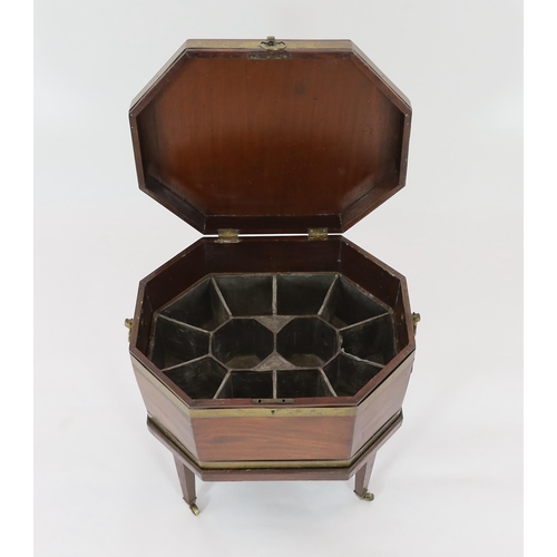 206 - A George III brass bound mahogany cellaret of octagonal form, with brass loop handles, divided lead ... 