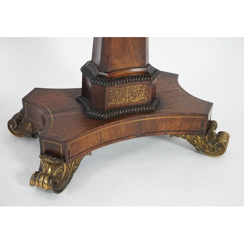 209 - A pair of Regency brass inset rosewood card tables inlaid throughout with foliate scrollwork, with f... 