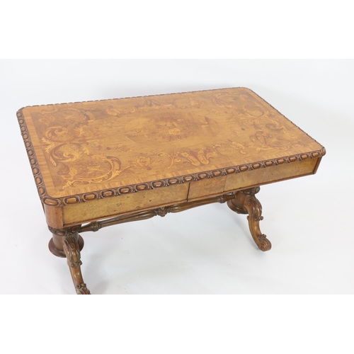 211 - A William IV marquetry inlaid walnut library table, the top inlaid with bird, flowers and scrolls wi... 