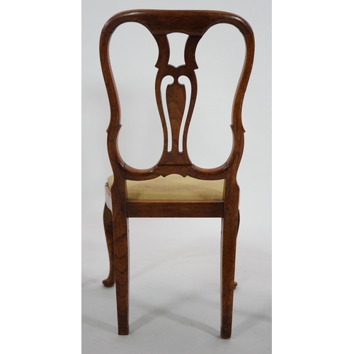 213 - A set of six 18th century Dutch walnut and marquetry dining chairs with floral inlaid hourglass shap... 