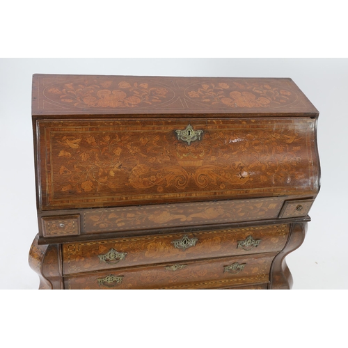 214 - A late 18th century Dutch oak and floral marquetry double bombe bureau decorated throughout with flo... 