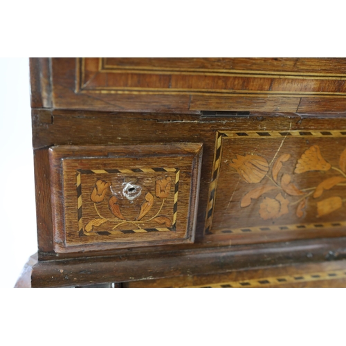 214 - A late 18th century Dutch oak and floral marquetry double bombe bureau decorated throughout with flo... 