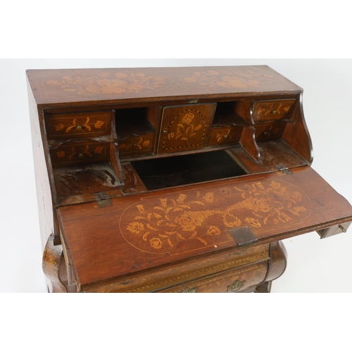 214 - A late 18th century Dutch oak and floral marquetry double bombe bureau decorated throughout with flo... 