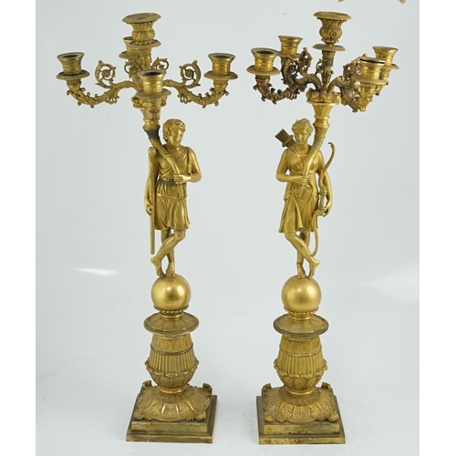 22 - After Pierre-Philippe Thomire (1751-1843), a pair of Regency French Empire five light candelabra wit... 