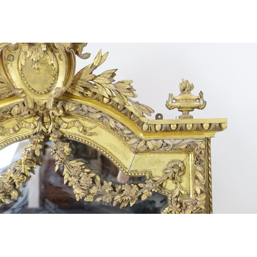 220 - A 19th century French carved giltwood wall mirror of architectural form with cartouche, laurel leaf ... 