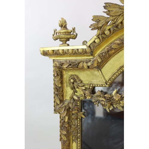 220 - A 19th century French carved giltwood wall mirror of architectural form with cartouche, laurel leaf ... 