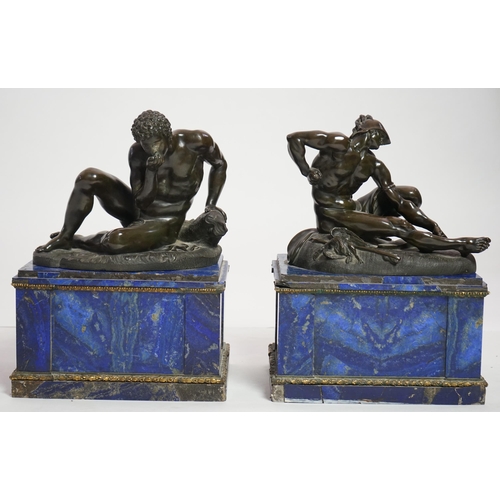 28 - After the antique, a pair of late 18th/early 19th century Grand Tour souvenir bronze figures of seat... 