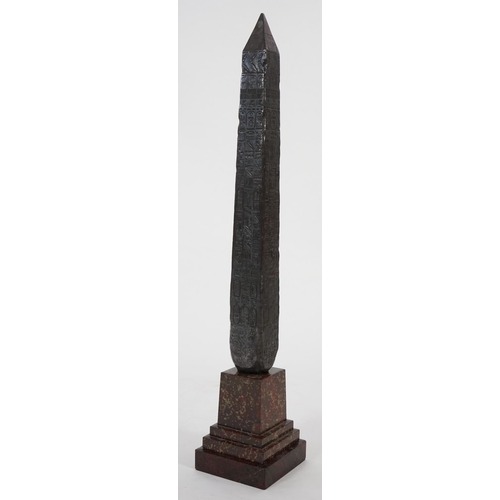 3 - A 19th century Grand Tour style bronzed model of Cleopatra's Needle standing upon a stepped serpenti... 