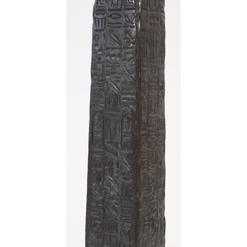3 - A 19th century Grand Tour style bronzed model of Cleopatra's Needle standing upon a stepped serpenti... 