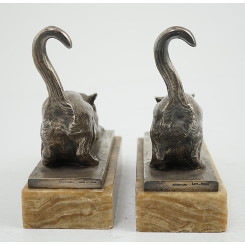 39 - Louis Riché (French, 1877-1949), a pair of silvered bronze bookends modelled as stretching cats, sig... 