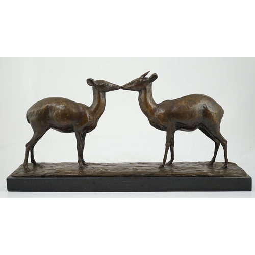41 - Samuel Granowsky (Ukranian, 1889-1942), an unusual bronze group of two deer standing upon a naturali... 