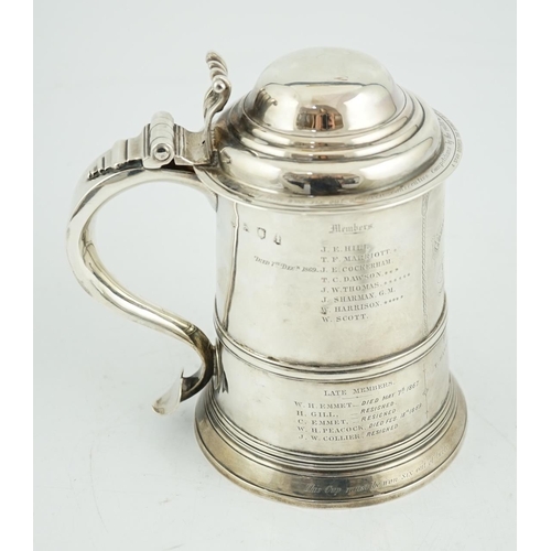 418 - A George II silver tankard with domed cover, by Richard Bayley?, with banded girdle, scroll thumbpie... 