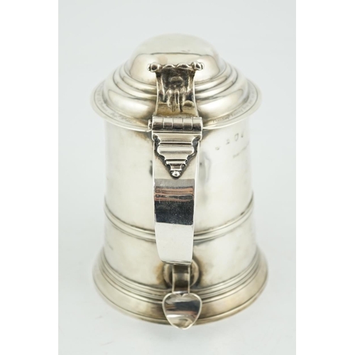 418 - A George II silver tankard with domed cover, by Richard Bayley?, with banded girdle, scroll thumbpie... 