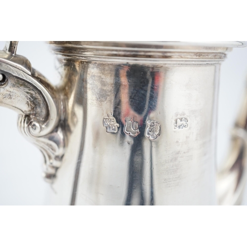 420 - A George II silver coffee pot, possibly by William & Robert Peaston, of tapering form, with engraved... 