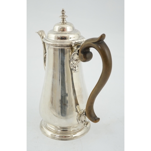 420 - A George II silver coffee pot, possibly by William & Robert Peaston, of tapering form, with engraved... 