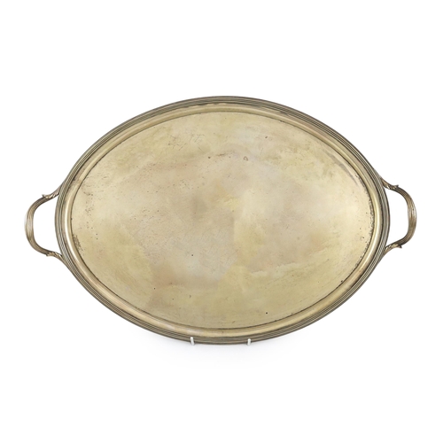 422 - A George III silver oval two handled tea tray by William Bennett, with reeded handles and border, Lo... 