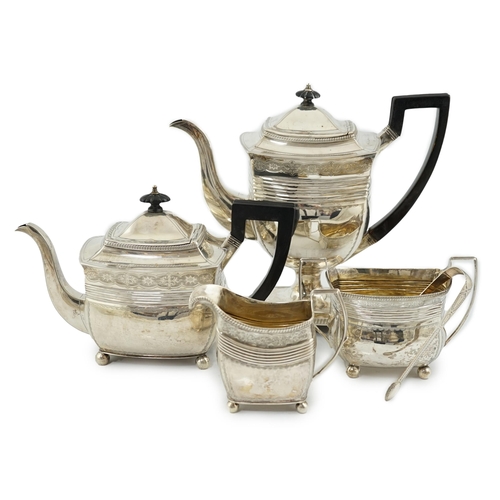 433 - A George III engraved silver four piece tea and coffee service, by Peter & William Bateman, with sha... 